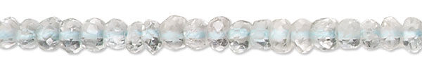 a strand of Goshenite Gemstone Beads on white background